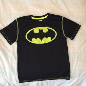 A youth black and neon batman short sleeve shirt